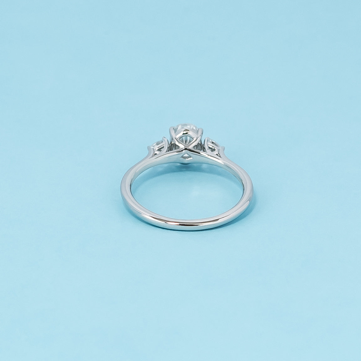 Trinity Oval Cut Moissanite Engagement Ring Set in 9ct White Gold