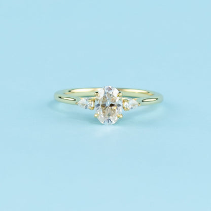 Trinity Oval Cut Moissanite Engagement Ring Set in 9ct Yellow Gold
