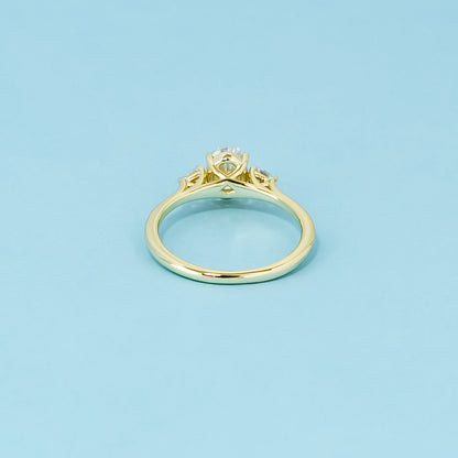 Trinity Oval Cut Moissanite Engagement Ring Set in 9ct Yellow Gold