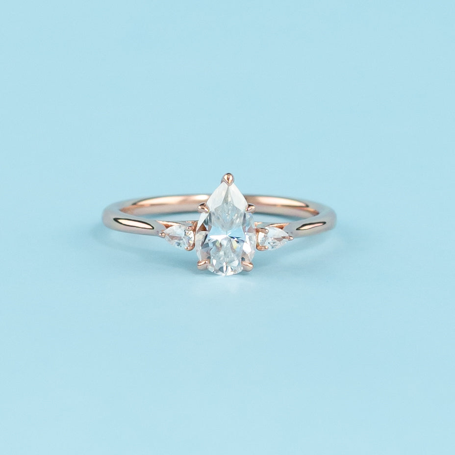 Trinity Pear Shape Moissanite Engagement Ring Set in 9ct Rose Gold