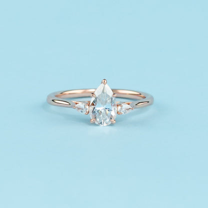 Trinity Pear Shape Moissanite Engagement Ring Set in 9ct Rose Gold