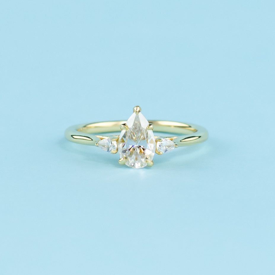 Trinity Pear Shape Moissanite Engagement Ring Set in 9ct Yellow Gold
