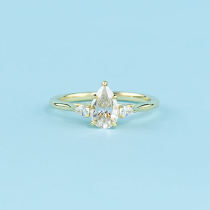 Trinity Pear Shape Moissanite Engagement Ring Set in 9ct Yellow Gold