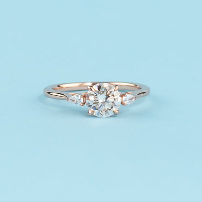 Trinity Round Brilliant Moissanite Engagement Ring Set in 9ct Rose Gold