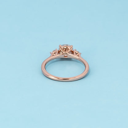 Trinity Round Brilliant Moissanite Engagement Ring Set in 9ct Rose Gold