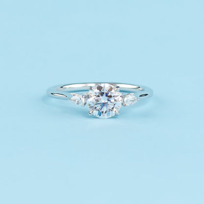 Trinity Round Brilliant Moissanite Engagement Ring Set in 9ct White Gold