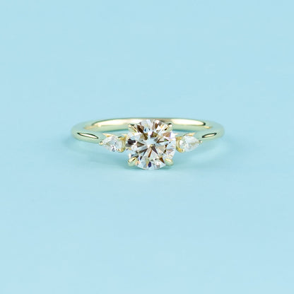 Trinity Round Brilliant Moissanite Engagement Ring Set in 9ct Yellow Gold