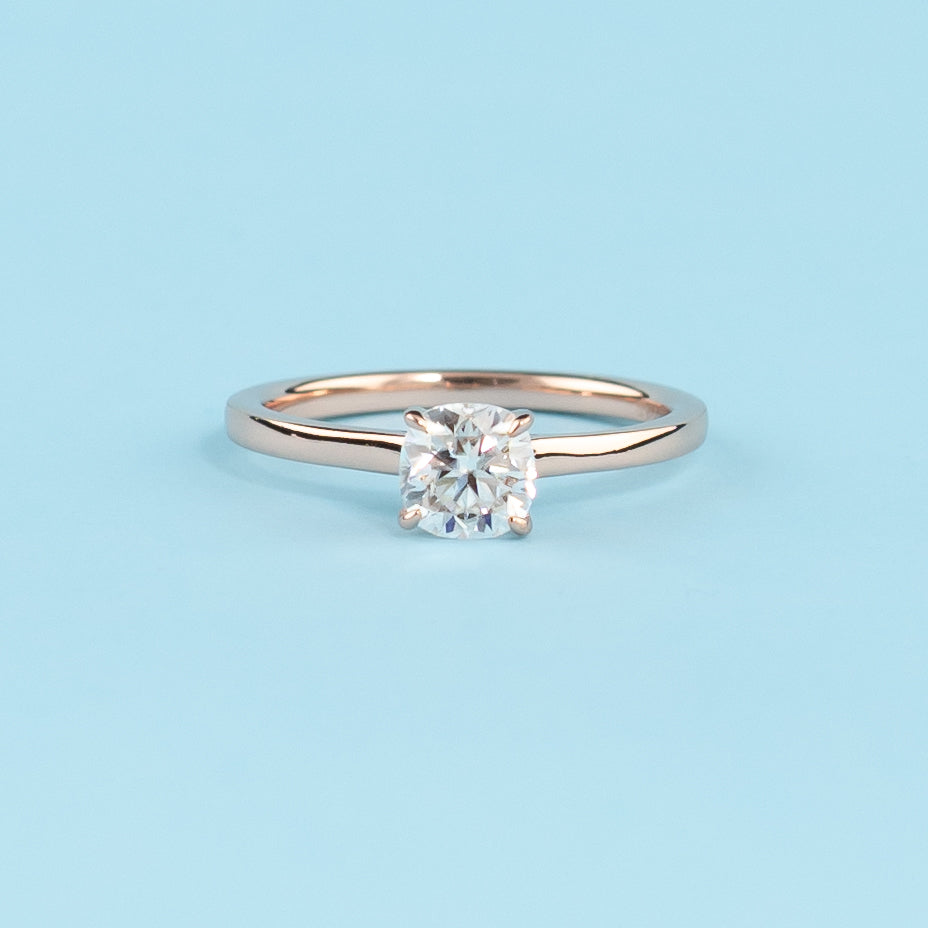 Hidden Halo Cushion Cut Moissanite Engagement Ring Set in 9ct Rose Gold