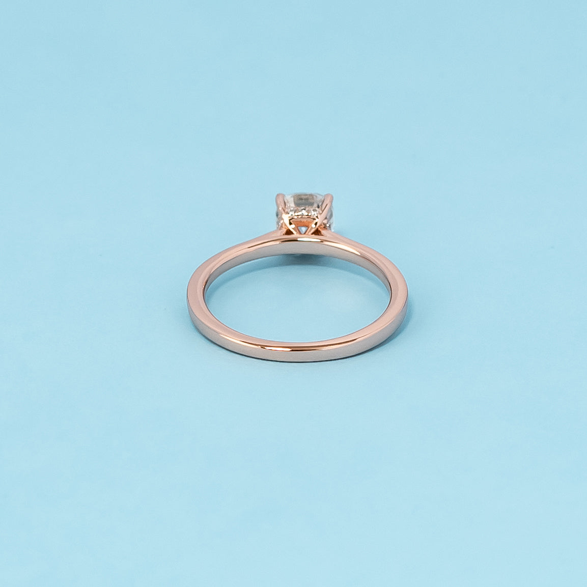 Hidden Halo Cushion Cut Moissanite Engagement Ring Set in 9ct Rose Gold