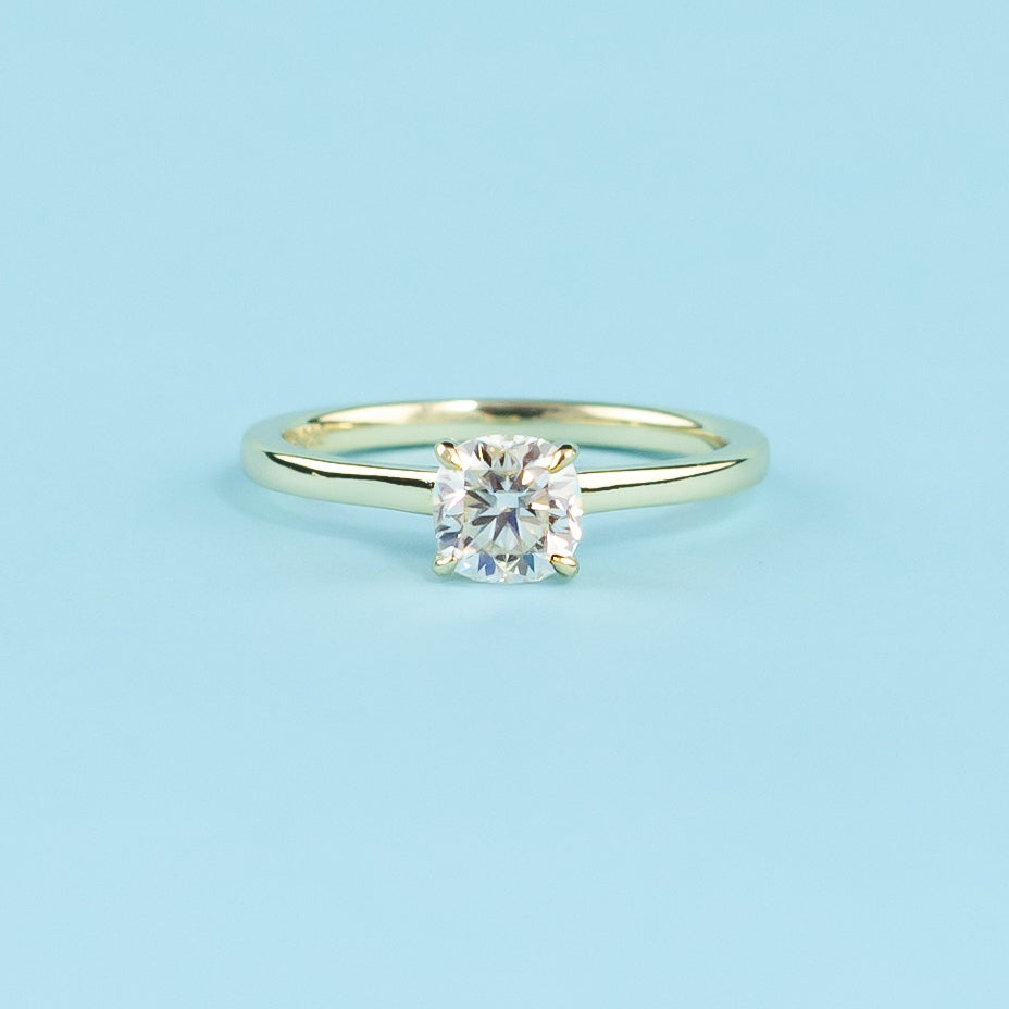 Hidden Halo Cushion Cut Moissanite Engagement Ring Set in 9ct Yellow Gold