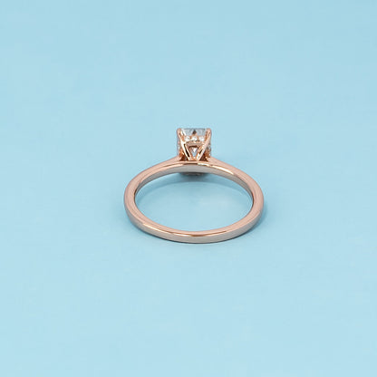 Hidden Halo Emerald Cut Moissanite Engagement Ring Set in 9ct Rose Gold