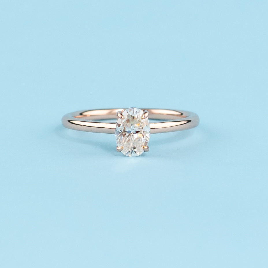 Hidden Halo Oval Cut Moissanite Engagement Ring Set in 9ct Rose Gold