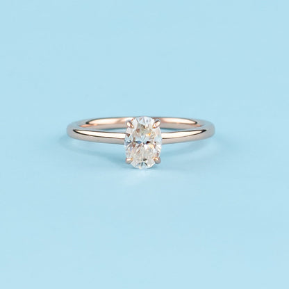 Hidden Halo Oval Cut Moissanite Engagement Ring Set in 9ct Rose Gold