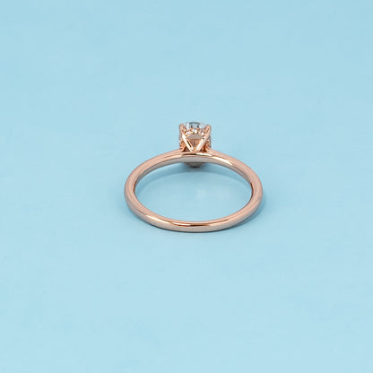 Hidden Halo Oval Cut Moissanite Engagement Ring Set in 9ct Rose Gold