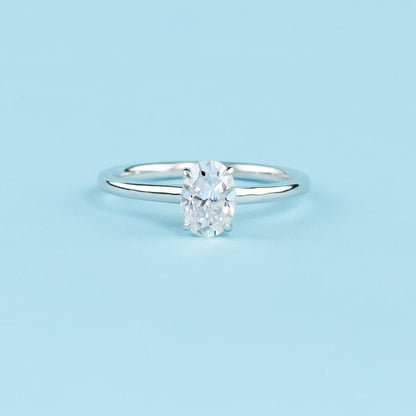 Hidden Halo Oval Cut Moissanite Engagement Ring Set in 9ct White Gold