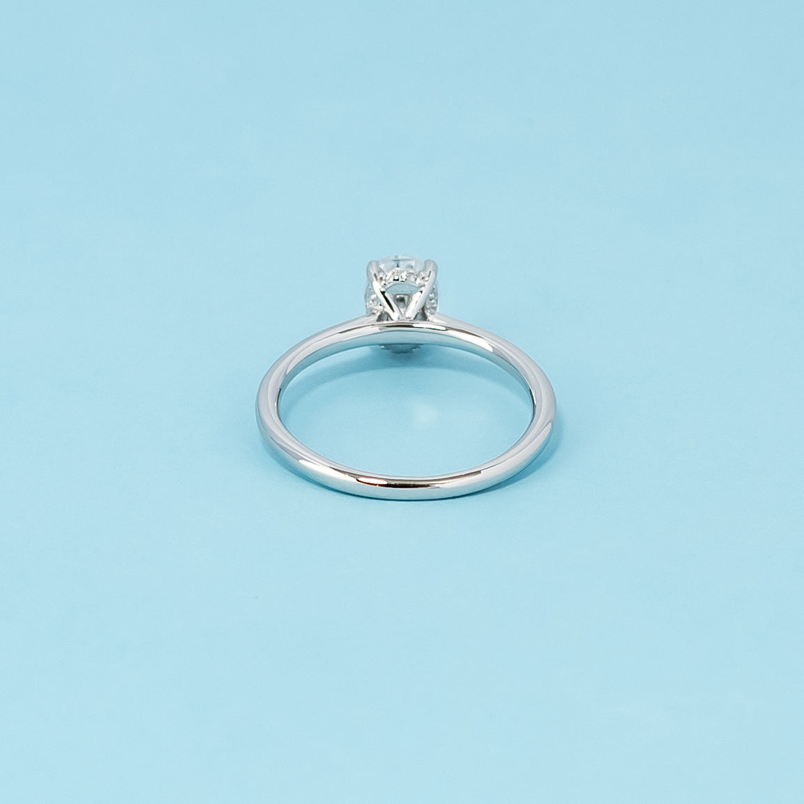 Hidden Halo Oval Cut Moissanite Engagement Ring Set in 9ct White Gold