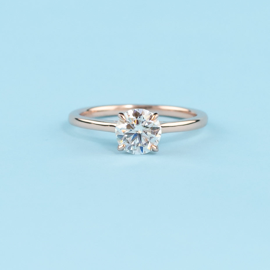 Hidden Halo Round Brilliant Moissanite Engagement Ring Set in 9ct Rose Gold