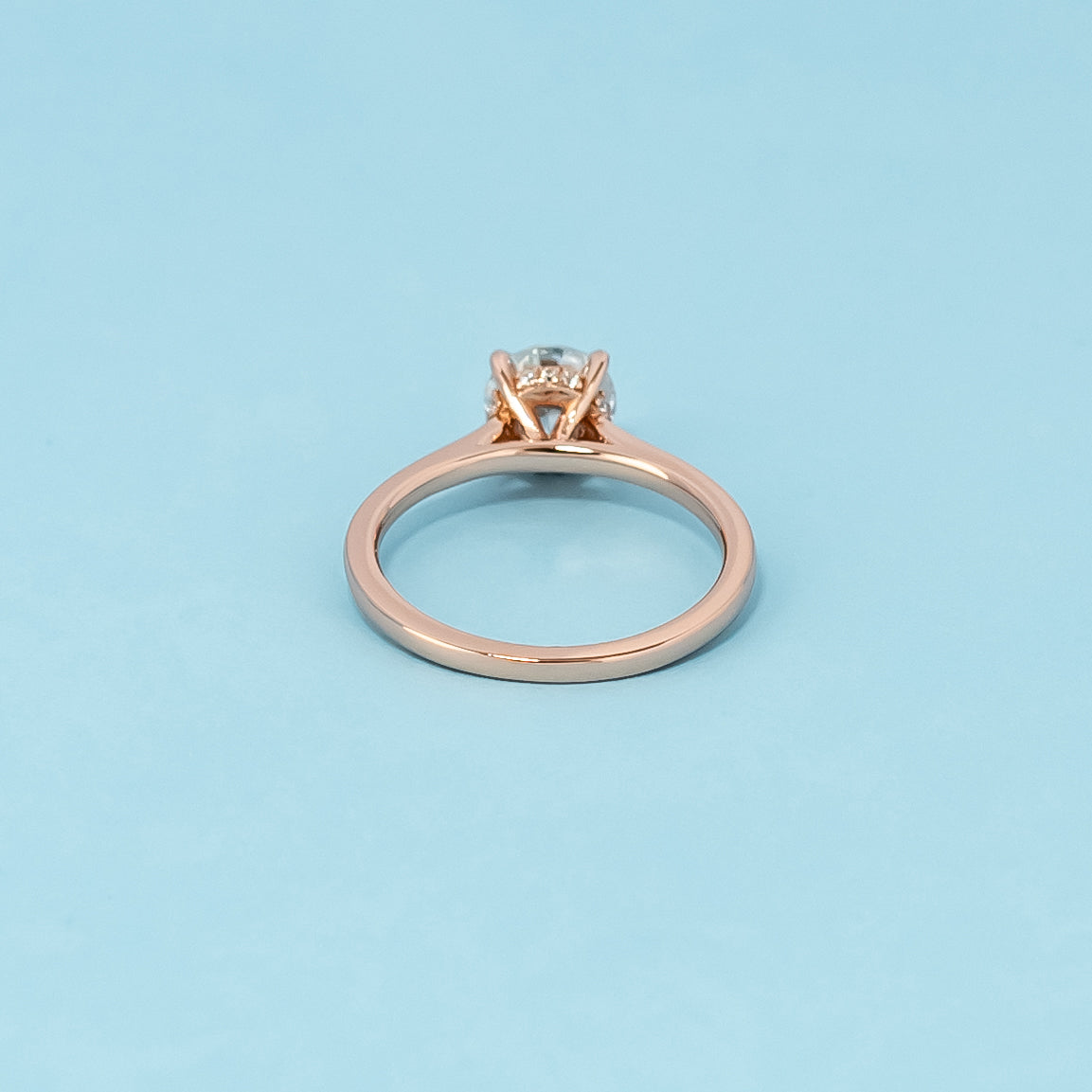 Hidden Halo Round Brilliant Moissanite Engagement Ring Set in 9ct Rose Gold