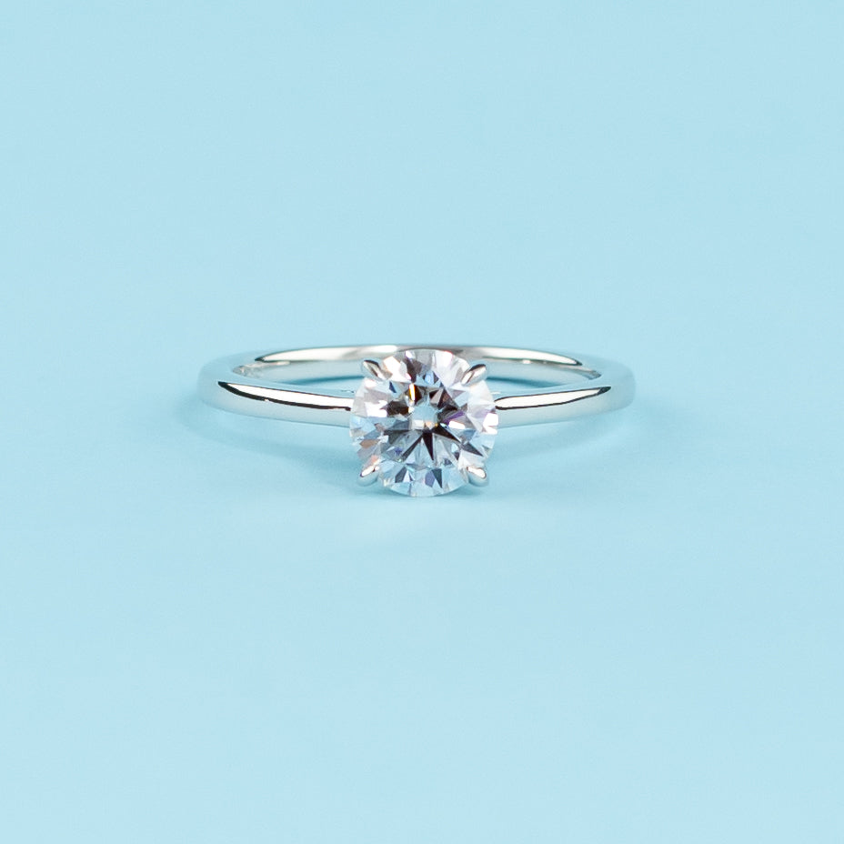 Hidden Halo Round Brilliant Moissanite Engagement Ring Set in 9ct White Gold