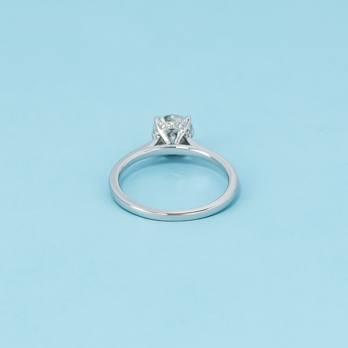 Hidden Halo Round Brilliant Moissanite Engagement Ring Set in 9ct White Gold