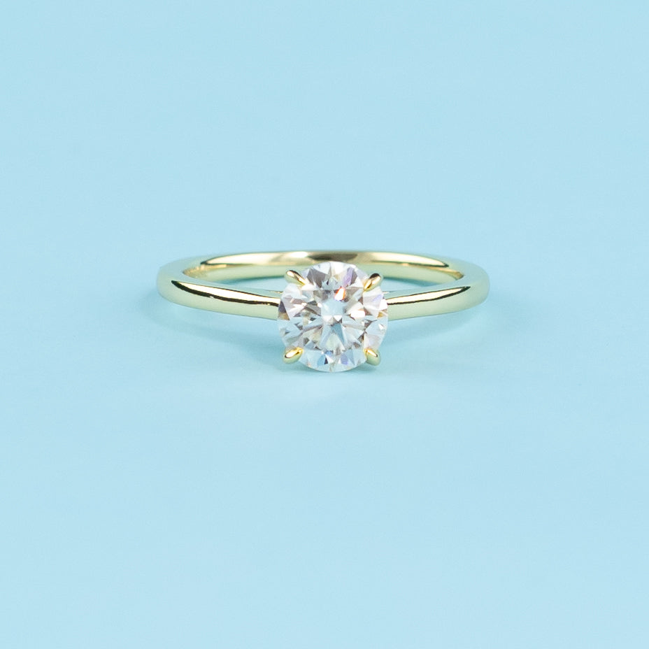 Hidden Halo Round Brilliant Moissanite Engagement Ring Set in 9ct Yellow Gold