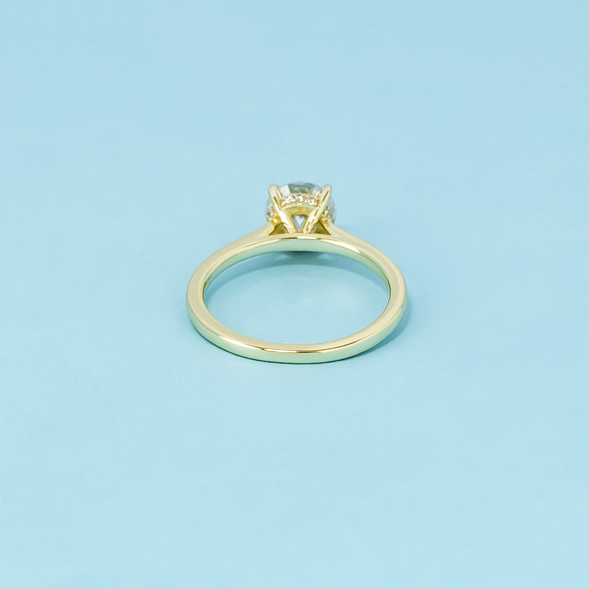 Hidden Halo Round Brilliant Moissanite Engagement Ring Set in 9ct Yellow Gold