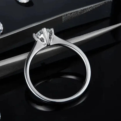 Solitaire 4 Heart Shaped Claws 0.50ct Moissanite Engagement Ring Set in Sterling Silver