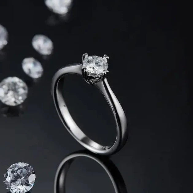 Solitaire 4 Heart Shaped Claws 0.50ct Moissanite Engagement Ring Set in Sterling Silver