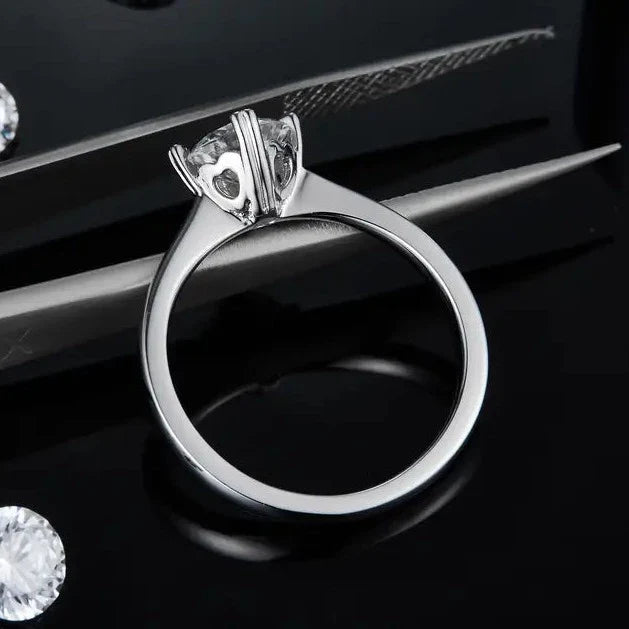 Solitaire 4 Heart Shaped Claws 1.00ct Moissanite Engagement Ring Set in Sterling Silver