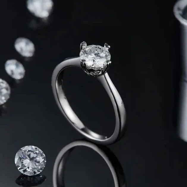 Solitaire 4 Heart Shaped Claws 1.00ct Moissanite Engagement Ring Set in Sterling Silver