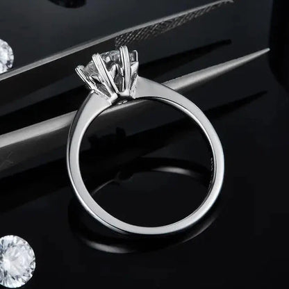 Solitaire 6 Heart Shaped Claws 1.00ct Moissanite Engagement Ring Set in Sterling Silver