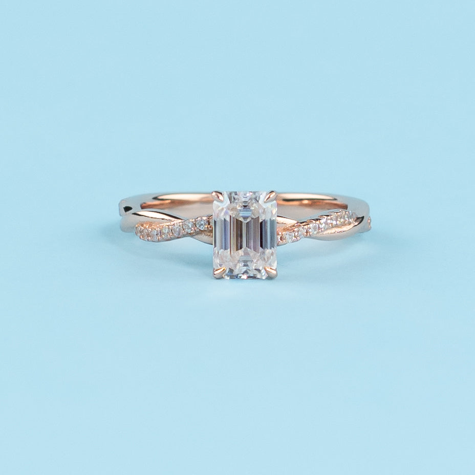 Spiral Emerald Cut Moissanite Engagement Ring Set in 9ct Rose Gold