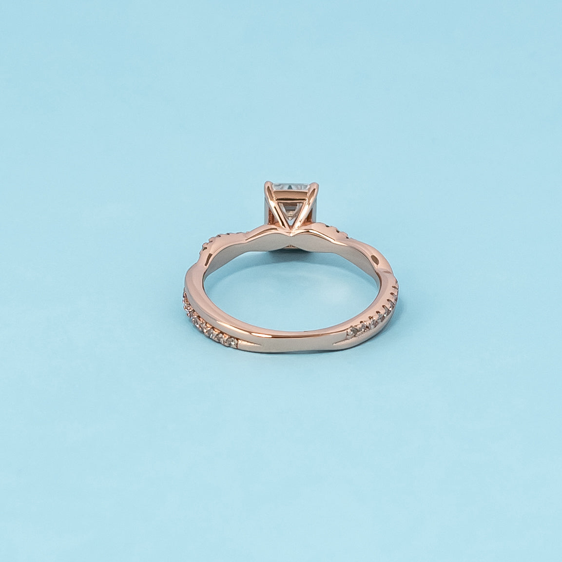 Spiral Emerald Cut Moissanite Engagement Ring Set in 9ct Rose Gold