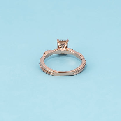 Spiral Emerald Cut Moissanite Engagement Ring Set in 9ct Rose Gold