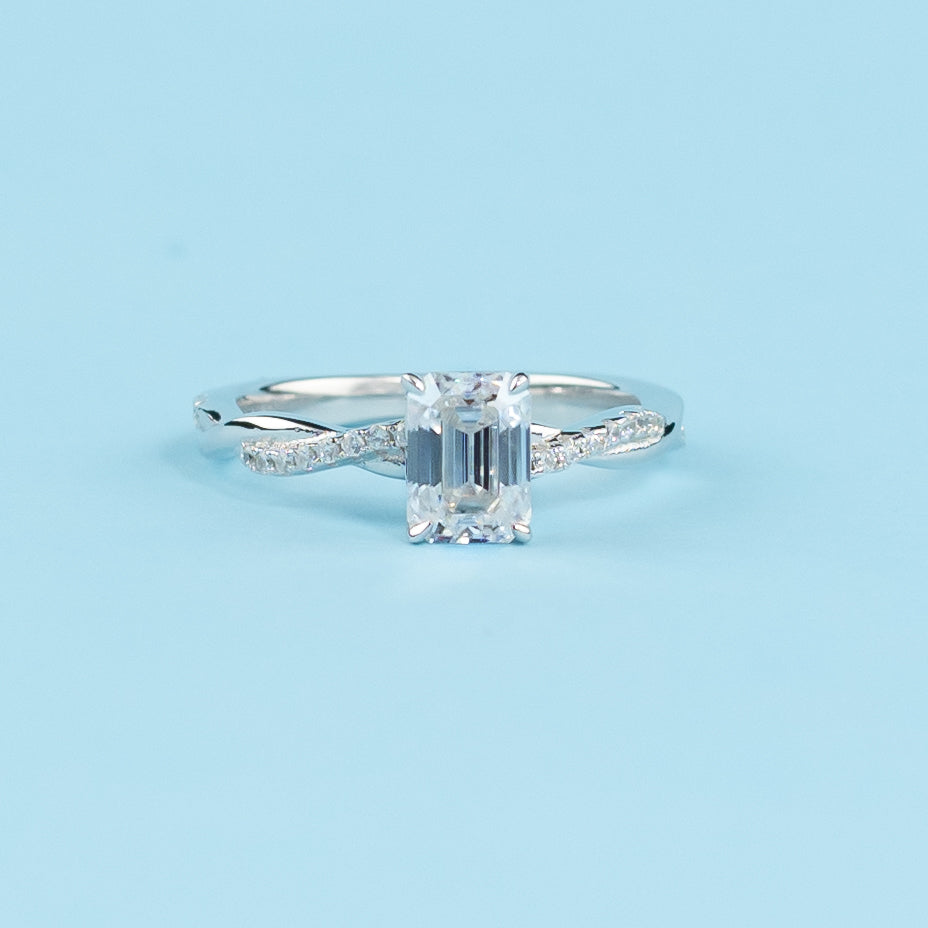 Spiral Emerald Cut Moissanite Engagement Ring Set in 9ct White Gold