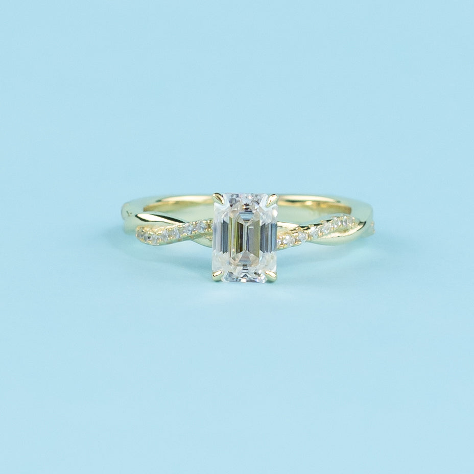 Spiral Emerald Cut Moissanite Engagement Ring Set in 9ct Yellow Gold