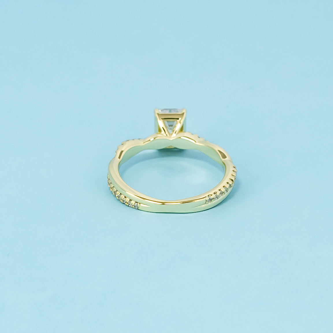 Spiral Emerald Cut Moissanite Engagement Ring Set in 9ct Yellow Gold