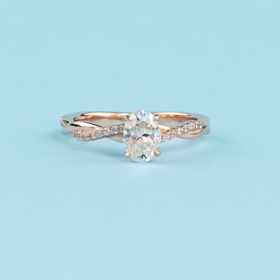 Spiral Oval Cut Moissanite Engagement Ring Set in 9ct Rose Gold