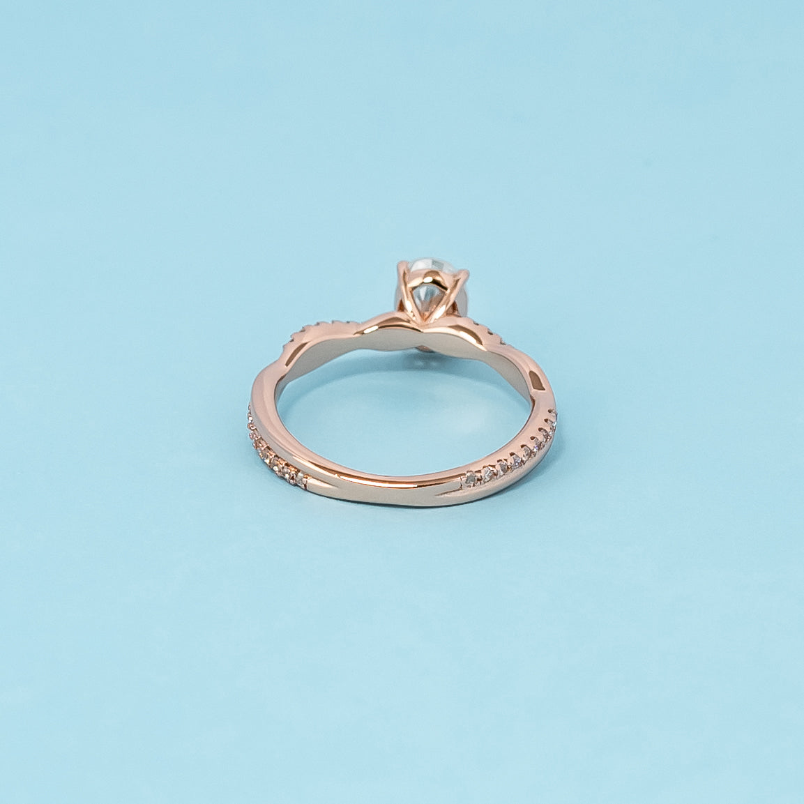 Spiral Oval Cut Moissanite Engagement Ring Set in 9ct Rose Gold