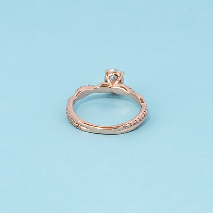 Spiral Oval Cut Moissanite Engagement Ring Set in 9ct Rose Gold