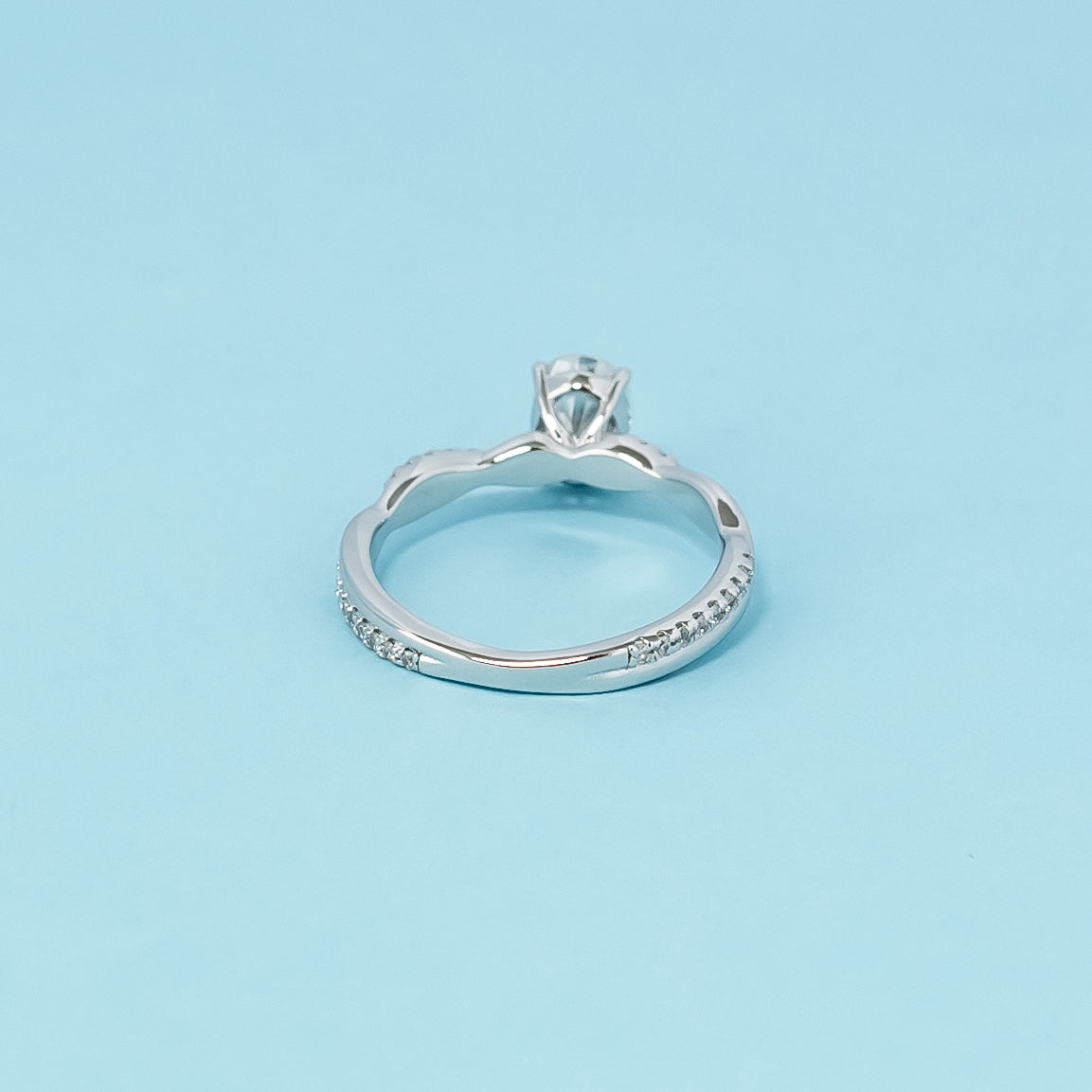 Spiral Oval Cut Moissanite Engagement Ring Set in 9ct White Gold