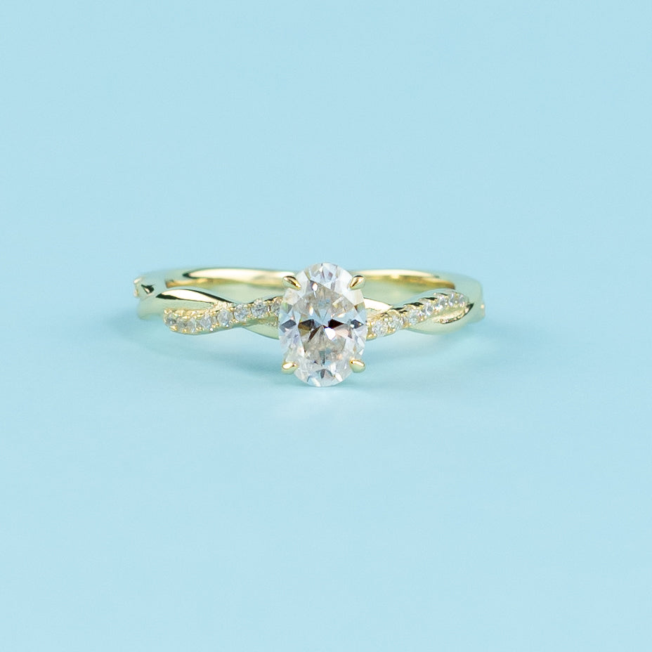 Spiral Oval Cut Moissanite Engagement Ring Set in 9ct Yellow Gold