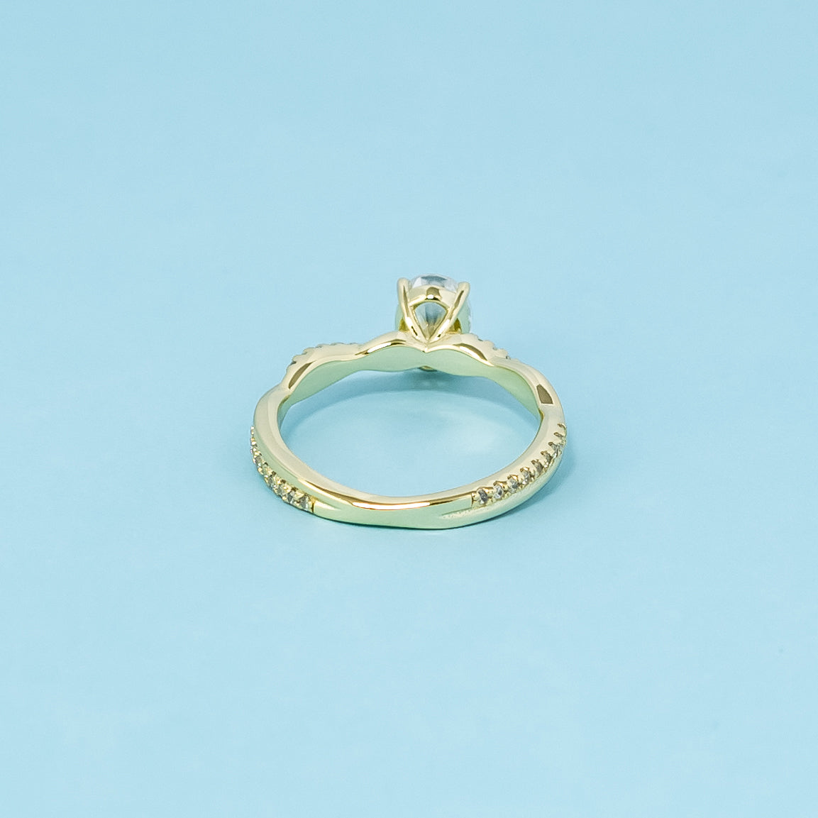 Spiral Oval Cut Moissanite Engagement Ring Set in 9ct Yellow Gold