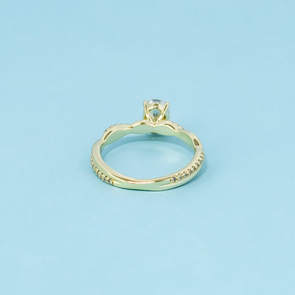 Spiral Oval Cut Moissanite Engagement Ring Set in 9ct Yellow Gold