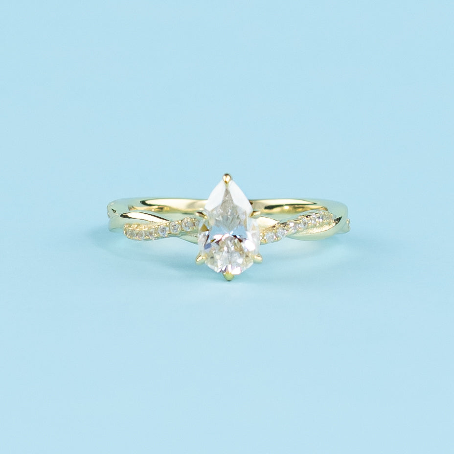 Spiral Pear Shape Moissanite Engagement Ring Set in 9ct Yellow Gold