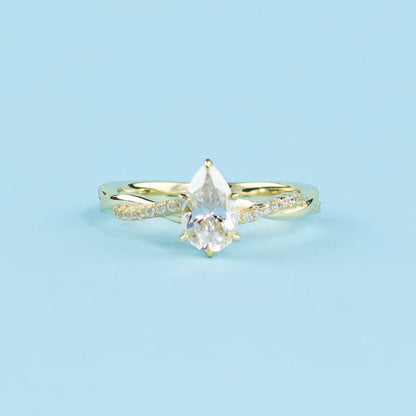 Spiral Pear Shape Moissanite Engagement Ring Set in 9ct Yellow Gold