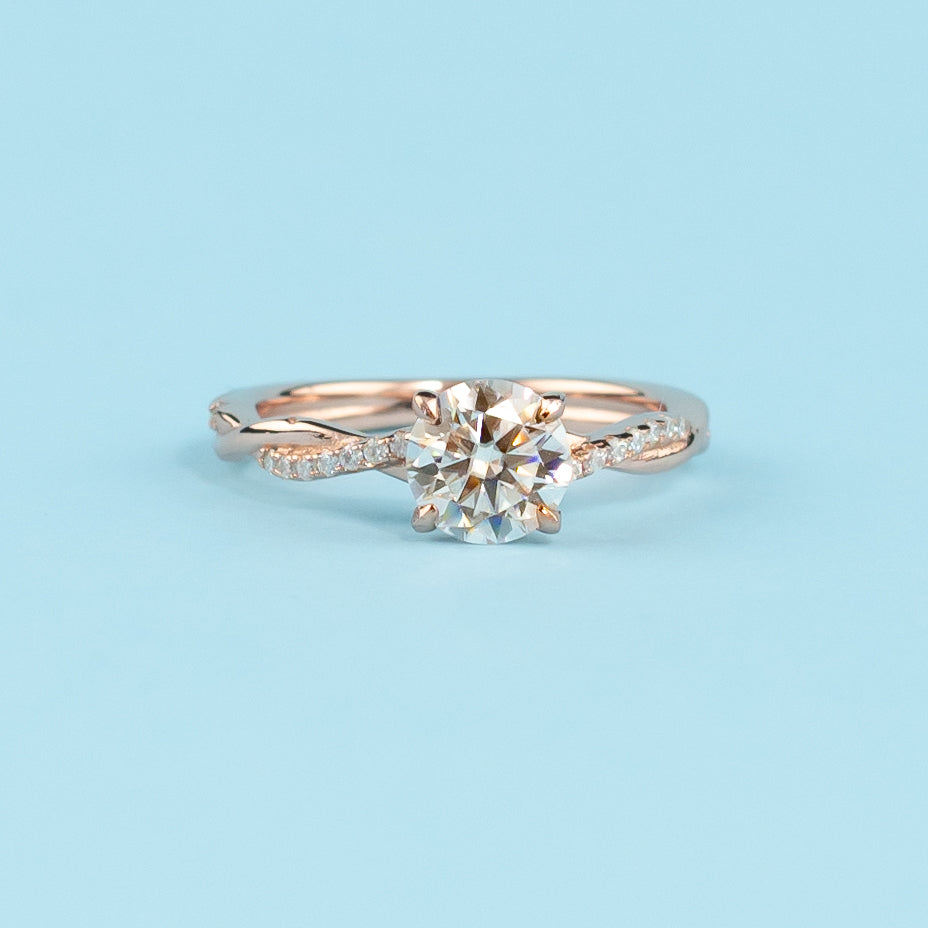Spiral Round Brilliant Moissanite Engagement Ring Set in 9ct Rose Gold
