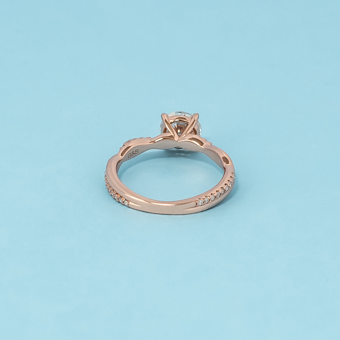 Spiral Round Brilliant Moissanite Engagement Ring Set in 9ct Rose Gold