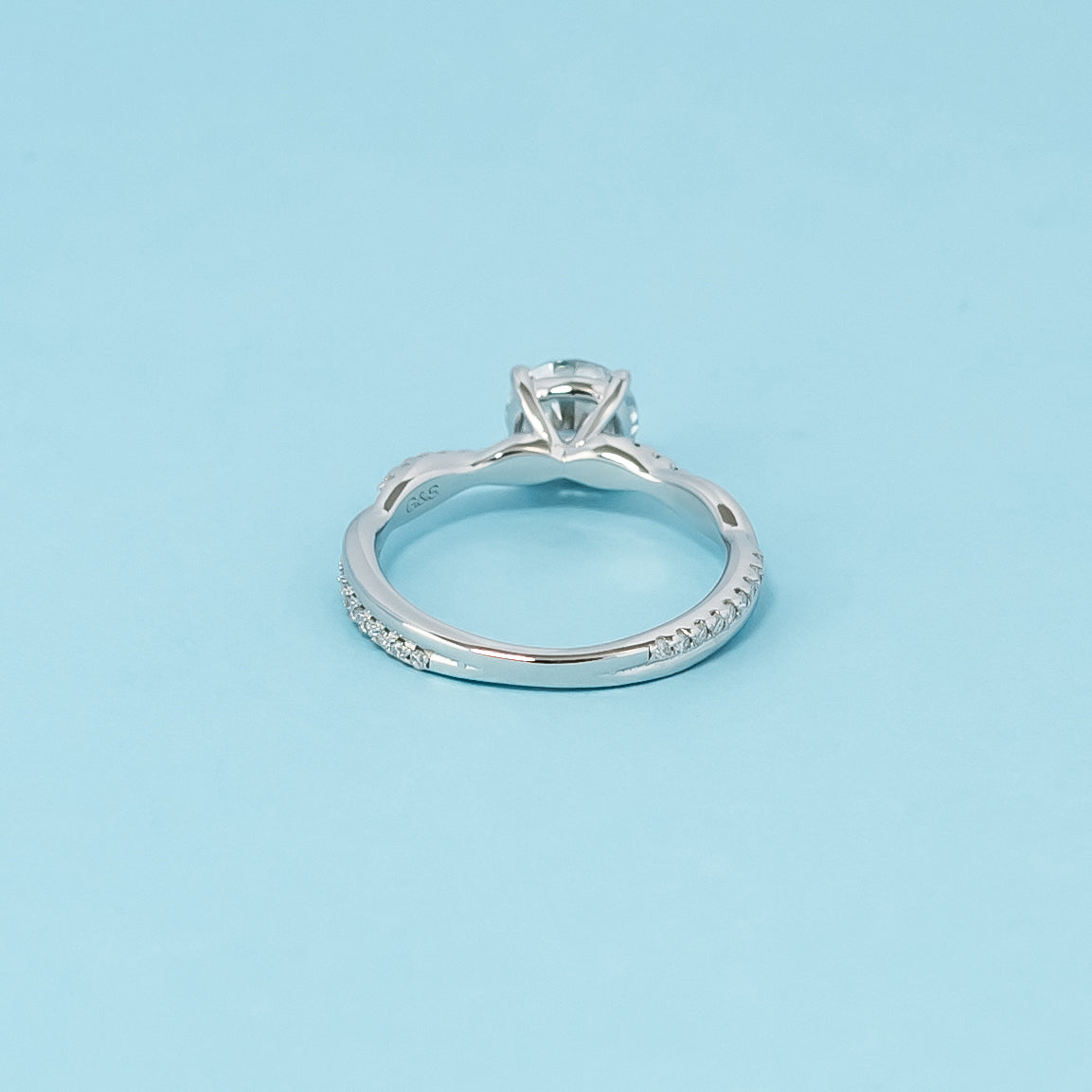 Spiral Round Brilliant Moissanite Engagement Ring Set in 9ct White Gold