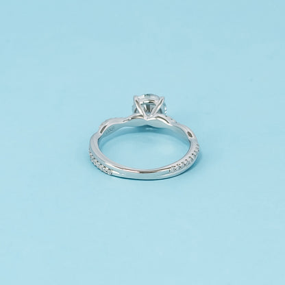 Spiral Round Brilliant Moissanite Engagement Ring Set in 9ct White Gold